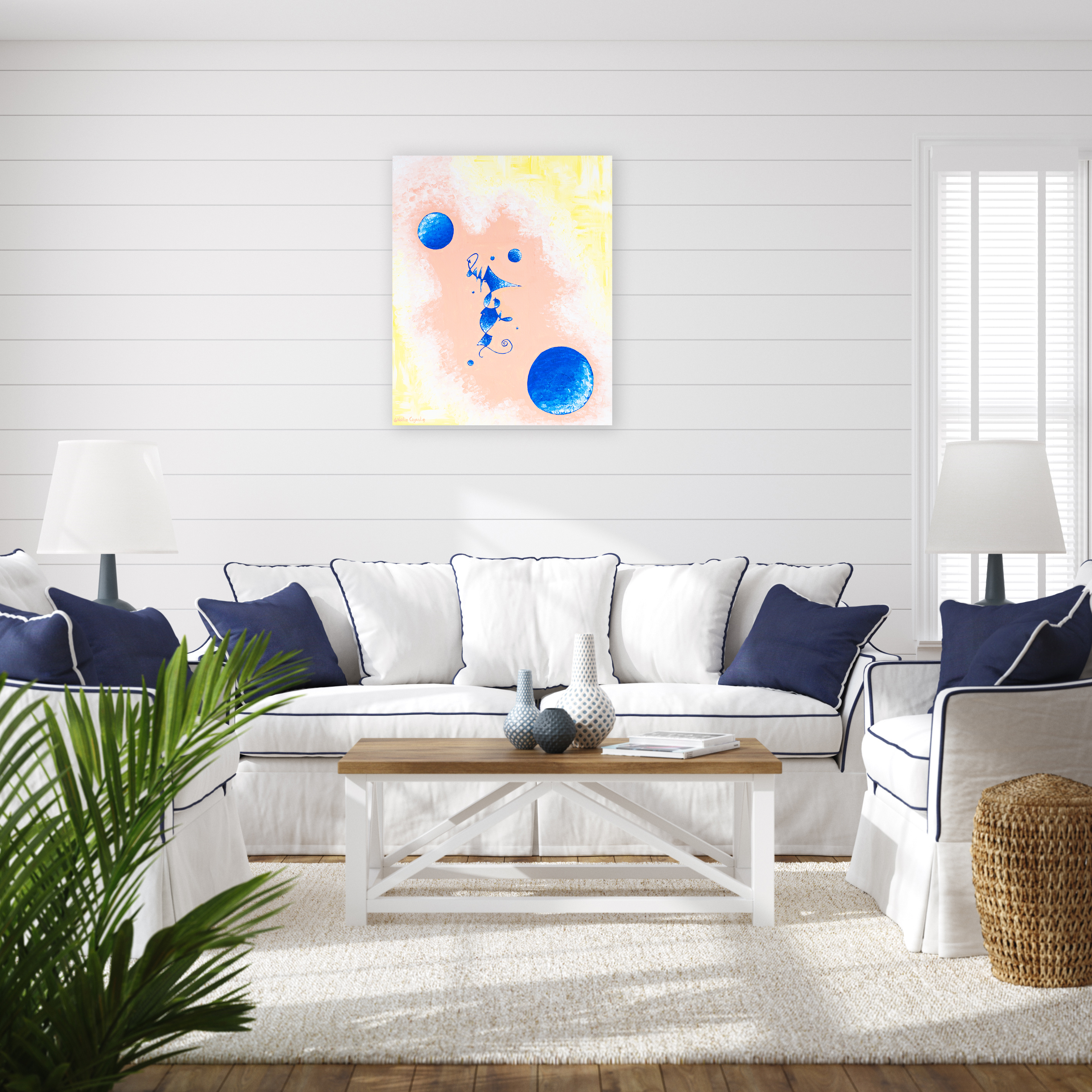 revealing_what_has_been_silenced_by_noelie_ceyral_with_white_sofa_with_blue_cushions_and_white_background